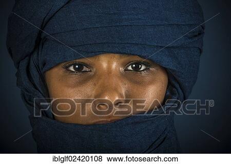 Stock Photo - Tuareg girl, Targia, veiled with a chech, portrait, Algeria, North Africa, Africa. Fotosearch