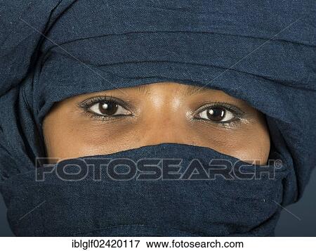 Tuareg girl, Targia, veiled with a chech with only her eyes visible, Algeria, North Africa, Africa View Large Photo Image Stock Photo - Tuareg girl, Targia, veiled with a chech with only her eyes visible, Algeria, North Africa, Africa. Fotosearch