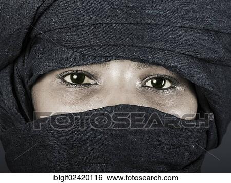 Tuareg girl, Targia, veiled with a chech with only her eyes visible, Algeria, North Africa, Africa View Large Photo Image Stock Photograph - Tuareg girl, Targia, veiled with a chech with only her eyes visible, Algeria, North Africa, Africa. Fotosearch
