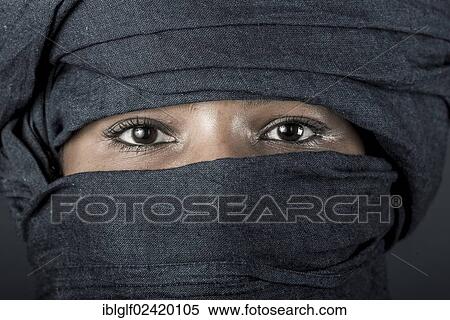 Tuareg girl, Targia, veiled with a chech with only her eyes visible, Algeria, North Africa, Africa View Large Photo Image Stock Photography - Tuareg girl, Targia, veiled with a chech with only her eyes visible, Algeria, North Africa, Africa. Fotosearch