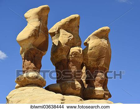 "Tubby Parade, Devil's Garden, eroded hoodoos and rock formations of Entrada Sandstone, goblins, Hole-In-The-Rock Road, Grand Staircase-Escalante National Monument, Utah, United States, North America" View Large Photo Image Picture - "Tubby Parade, Devil's Garden, eroded hoodoos and rock formations of Entrada Sandstone, goblins, Hole-In-The-Rock Road, Grand Staircase-Escalante National Monument, Utah, United States, North America". Fotosearch