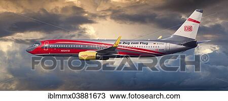 "TUIfly Boeing 737-8K5 WL, Rail and Fly, with the slogan """"Im Zug zum Flug"""", German for """"On the train to the plane"""", in flight, in the evening light" View Large Photo Image Stock Image - "TUIfly Boeing 737-8K5 WL, Rail and Fly, with the slogan """"Im Zug zum Flug"""", German for """"On the train to the plane"""", in flight, in the evening light". Fotosearch
