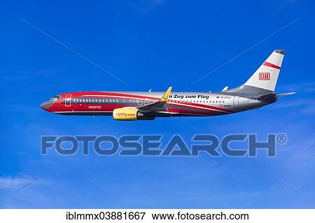 "TUIfly Boeing 737-8K5 WL, Rail and Fly, with the slogan """"Im Zug zum Flug"""", German for """"On the train to the plane"""", in flight" View Large Photo Image Stock Photo - "TUIfly Boeing 737-8K5 WL, Rail and Fly, with the slogan """"Im Zug zum Flug"""", German for """"On the train to the plane"""", in flight". Fotosearch