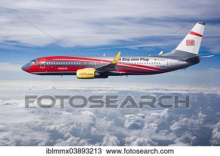 "TUIfly Boeing 737-8K5 WL, with the slogan """"Im Zug zum Flug"""", German for """"take the train to the plane"""", rail and fly, in flight over mountains, Turkey, Asia" View Large Photo Image Stock Image - "TUIfly Boeing 737-8K5 WL, with the slogan """"Im Zug zum Flug"""", German for """"take the train to the plane"""", rail and fly, in flight over mountains, Turkey, Asia". Fotosearch