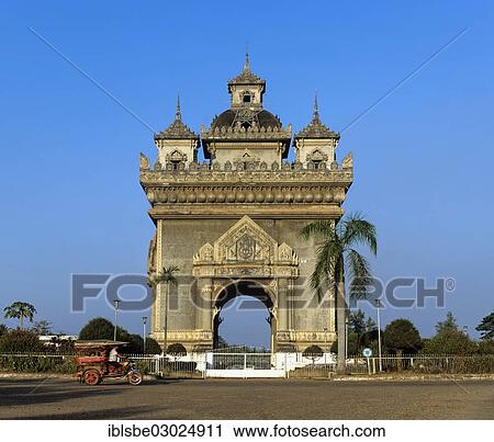 "Tuk Tuk passing Patou Xai triumphal arch, Xang Boulevard, Vientiane, Vientiane Province, Laos, Asia" View Large Photo Image Stock Image - "Tuk Tuk passing Patou Xai triumphal arch, Xang Boulevard, Vientiane, Vientiane Province, Laos, Asia". Fotosearch