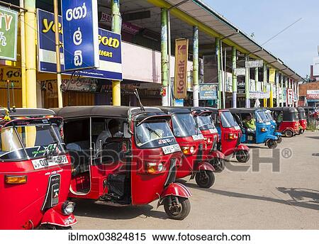 "Tuk tuks, auto rickshaws waiting for customers near Beruwela, Walawatta Region, Western Province, Sri Lanka, Asia" View Large Photo Image Stock Photography - "Tuk tuks, auto rickshaws waiting for customers near Beruwela, Walawatta Region, Western Province, Sri Lanka, Asia". Fotosearch