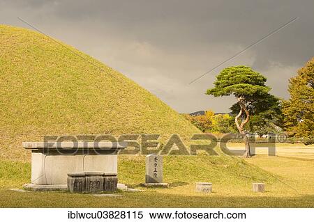 "Tumulus grave in front of a mystically darkened sky, Gyeoungju, South Korea, Asia" View Large Photo Image Stock Photography - "Tumulus grave in front of a mystically darkened sky, Gyeoungju, South Korea, Asia". Fotosearch
