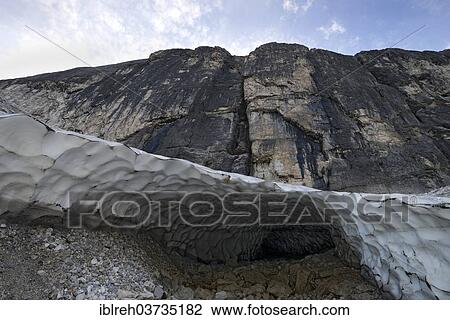 "Tunnel of an old snow field, Gschnitztal valley, Tyrol, Austria, Europe" View Large Photo Image Stock Image - "Tunnel of an old snow field, Gschnitztal valley, Tyrol, Austria, Europe". Fotosearch