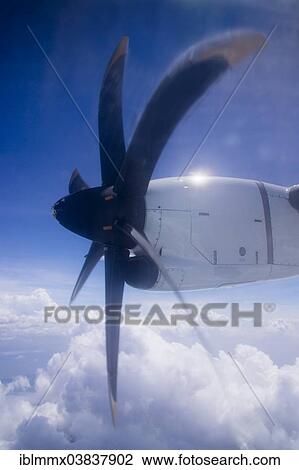 Stock Image - "Turboprop aircraft ATR 72-500, in flight, Asia". Fotosearch