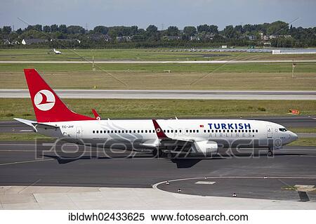 Stock Photography - "Turkish Airlines TC-JHF Boeing 737-800 aircraft on the manoeuvring area, Duesseldorf International Airport, Duesseldorf, North Rhine-Westphalia, Germany, Europe". Fotosearch