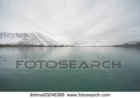 "Turquoise-coloured sea in front of snow-covered mountains, Smeerenburgfjorden, Spitsbergen Island, Svalbard Archipelago, Svalbard and Jan Mayen, Norway, Europe" View Large Photo Image Stock Photo - "Turquoise-coloured sea in front of snow-covered mountains, Smeerenburgfjorden, Spitsbergen Island, Svalbard Archipelago, Svalbard and Jan Mayen, Norway, Europe". Fotosearch