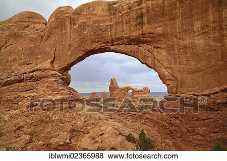 Stock Photo - "Turret Arch as seen through North Window, Windows Section, Arches National Park, Moab, Utah, United States of America, USA". Fotosearch