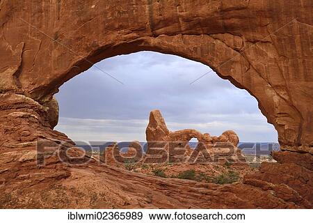 "Turret Arch as seen through North Window, Windows Section, Arches National Park, Moab, Utah, United States of America, USA" View Large Photo Image Stock Photo - "Turret Arch as seen through North Window, Windows Section, Arches National Park, Moab, Utah, United States of America, USA". Fotosearch