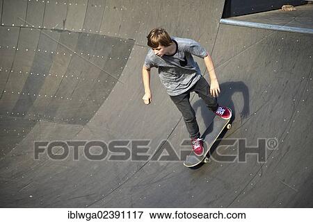 "Twelve-year-old skater, Lohserampe ramp, a skateboard park in Cologne, North Rhine-Westphalia, Germany, Europe, PublicGround, Europe" View Large Photo Image Stock Photo - "Twelve-year-old skater, Lohserampe ramp, a skateboard park in Cologne, North Rhine-Westphalia, Germany, Europe, PublicGround, Europe". Fotosearch