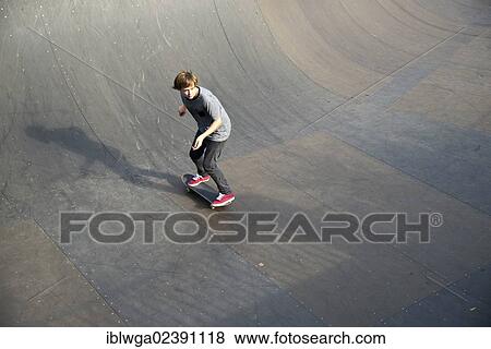 "Twelve-year-old skater, Lohserampe ramp, a skateboard park in Cologne, North Rhine-Westphalia, Germany, Europe, PublicGround, Europe" View Large Photo Image Stock Photo - "Twelve-year-old skater, Lohserampe ramp, a skateboard park in Cologne, North Rhine-Westphalia, Germany, Europe, PublicGround, Europe". Fotosearch