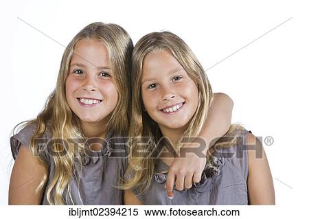 "Twin girls, 9" View Large Photo Image Stock Photography - "Twin girls, 9". Fotosearch