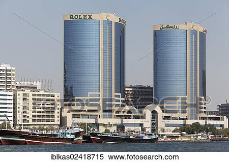 Twin Towers or Rolex Tower on Dubai Creek, Deira district, Dubai, United Arab Emirates, Middle East, Asia View Large Photo Image Stock Photography - Twin Towers or Rolex Tower on Dubai Creek, Deira district, Dubai, United Arab Emirates, Middle East, Asia. Fotosearch