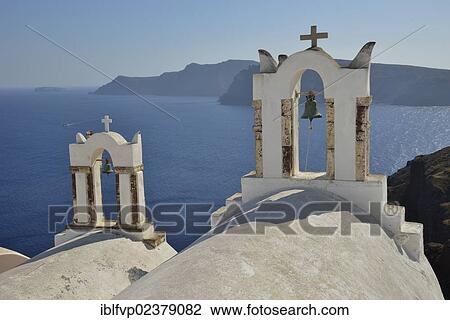 "Two bell towers in front of the blue colour of the Caldera, Fira or Thira, Santorini, Cyclades, Greek Islands, Greece, Europe" View Large Photo Image Stock Image - "Two bell towers in front of the blue colour of the Caldera, Fira or Thira, Santorini, Cyclades, Greek Islands, Greece, Europe". Fotosearch