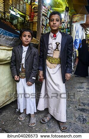 "Two boys with their djambas at the spice market in the old city, Sana'a, Yemen, Asia" View Large Photo Image Stock Image - "Two boys with their djambas at the spice market in the old city, Sana'a, Yemen, Asia". Fotosearch