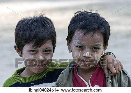 "Two children with Thanaka paste on their faces, in Bagan, Myanmar, Asia" View Large Photo Image Picture - "Two children with Thanaka paste on their faces, in Bagan, Myanmar, Asia". Fotosearch