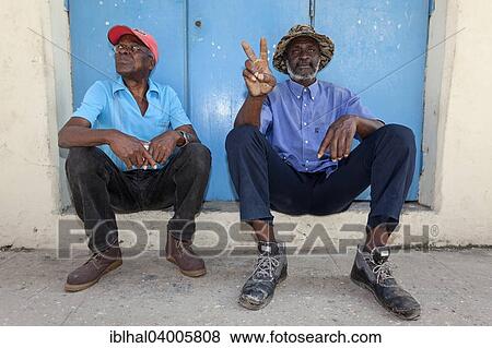 "Two Cuban men in Old Havana, Havana, Cuba, North America" View Large Photo Image Stock Photo - "Two Cuban men in Old Havana, Havana, Cuba, North America". Fotosearch