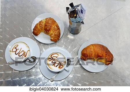 "Two cups of cappuccino, with writing Buon Giorno on the milk foam, two croissants, Sardinia, Italy, Europe" View Large Photo Image Picture - "Two cups of cappuccino, with writing Buon Giorno on the milk foam, two croissants, Sardinia, Italy, Europe". Fotosearch