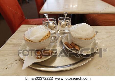 "Two cups of Melange coffee, Zauner Cafe, Bad Ischl, Salzkammergut resort area, Traunviertel region, Upper Austria, Austria, Europe" View Large Photo Image Stock Image - "Two cups of Melange coffee, Zauner Cafe, Bad Ischl, Salzkammergut resort area, Traunviertel region, Upper Austria, Austria, Europe". Fotosearch