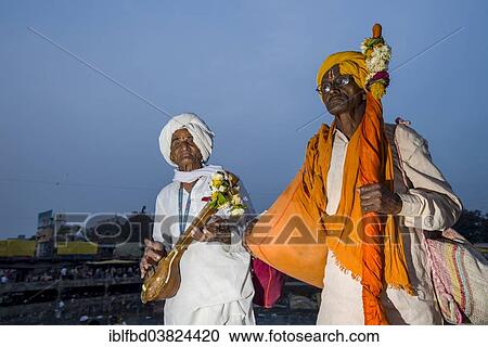 "Two devotees with their music instruments at the banks of the holy river Godwari, Nasik, Maharashtra, India, Asia" View Large Photo Image Stock Image - "Two devotees with their music instruments at the banks of the holy river Godwari, Nasik, Maharashtra, India, Asia". Fotosearch
