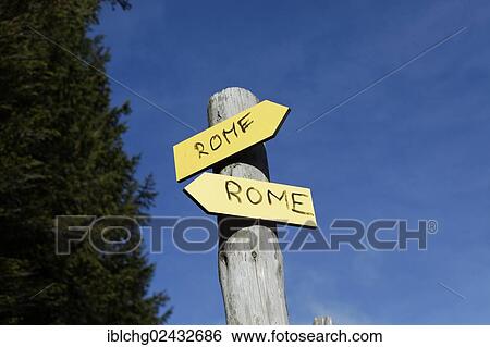 "Two direction signs to Rome, pointing in different directions, Monts Dore massif, valley of Fontaine Salee, Puy de Dome, Auvergne, France, Europe" View Large Photo Image Stock Photograph - "Two direction signs to Rome, pointing in different directions, Monts Dore massif, valley of Fontaine Salee, Puy de Dome, Auvergne, France, Europe". Fotosearch