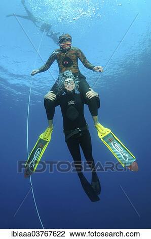 "Two freedivers, Symi, Aegean Sea, Greece, Europe" View Large Photo Image Stock Image - "Two freedivers, Symi, Aegean Sea, Greece, Europe". Fotosearch