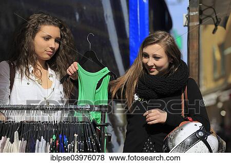 Stock Photo - "Two girlfriends, teens shopping, Menton, Maritime Alps, Provence Alpes, France, Europe". Fotosearch