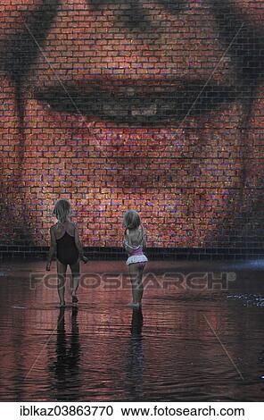 "Two girls standing in front of the Crown Fountain, Millennium Park, Chicago, Illinois, United States, North America" View Large Photo Image Stock Image - "Two girls standing in front of the Crown Fountain, Millennium Park, Chicago, Illinois, United States, North America". Fotosearch