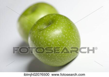 Two green Granny Smith apples View Large Photo Image Stock Image - Two green Granny Smith apples. Fotosearch