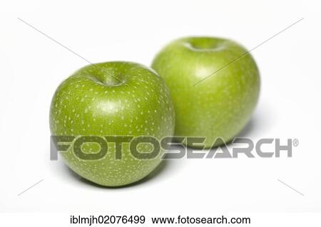 Two green Granny Smith apples View Large Photo Image Stock Photo - Two green Granny Smith apples. Fotosearch