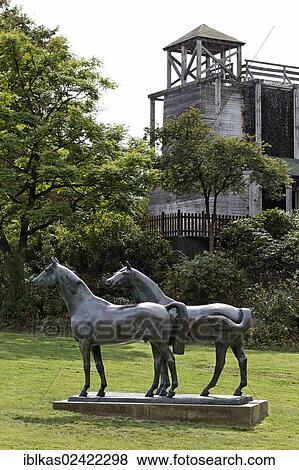 Two horses in a meadow, sculpture by Philip Hart, and a graduation tower, Grugapark, Essen, Ruhr area, North Rhine-Westphalia, Germany, Europe View Large Photo Image Stock Photo - Two horses in a meadow, sculpture by Philip Hart, and a graduation tower, Grugapark, Essen, Ruhr area, North Rhine-Westphalia, Germany, Europe. Fotosearch
