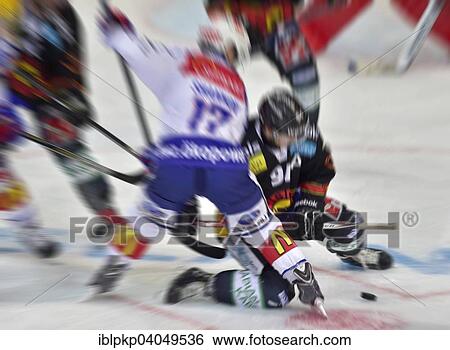 "Two ice hockey clashing in game, motion blur, zoom burst, Bern, Switzerland, Europe" View Large Photo Image Stock Photograph - "Two ice hockey clashing in game, motion blur, zoom burst, Bern, Switzerland, Europe". Fotosearch