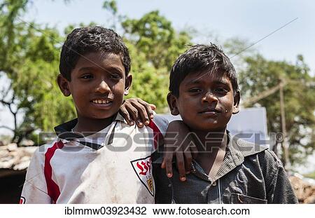 Stock Image - "Two Indian boys, portrait, Usilampatti, Tamil Nadu, India, Asia". Fotosearch