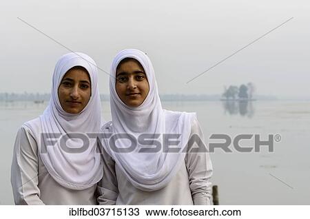"Two Kashmiri women wearing headscarves, Srinagar, Jammu and Kashmir, India, Asia" View Large Photo Image Stock Image - "Two Kashmiri women wearing headscarves, Srinagar, Jammu and Kashmir, India, Asia". Fotosearch