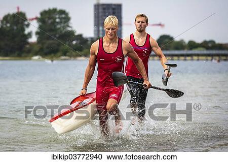 "Two kayakers carrying a kayak, Copenhagen Beach Marathon for kayak and canoe 2013, Copenhagen, Capital region, Denmark, Europe" View Large Photo Image Stock Image - "Two kayakers carrying a kayak, Copenhagen Beach Marathon for kayak and canoe 2013, Copenhagen, Capital region, Denmark, Europe". Fotosearch