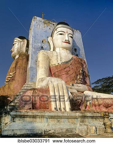 Stock Image - "Two large seated Buddhas, Kyaikpun Pagoda, Kyaik Pun Paya, Bago, Bago Region, Myanmar, Burma, Asia". Fotosearch