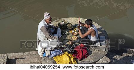 "Two men praying at the Bagmati River, Pashupatinath, Kathmandu, UNESCO World Heritage Site, Nepal, Asia" View Large Photo Image Picture - "Two men praying at the Bagmati River, Pashupatinath, Kathmandu, UNESCO World Heritage Site, Nepal, Asia". Fotosearch