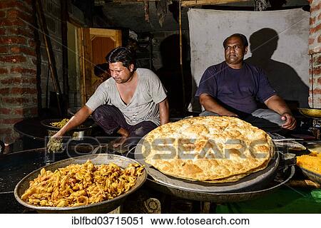 "Two men with kashmiri bread and namkin, snacks, at a shop, Srinagar, Jammu and Kashmir, India, Asia" View Large Photo Image Stock Image - "Two men with kashmiri bread and namkin, snacks, at a shop, Srinagar, Jammu and Kashmir, India, Asia". Fotosearch