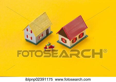 Two miniature houses View Large Photo Image Stock Photography - Two miniature houses. Fotosearch