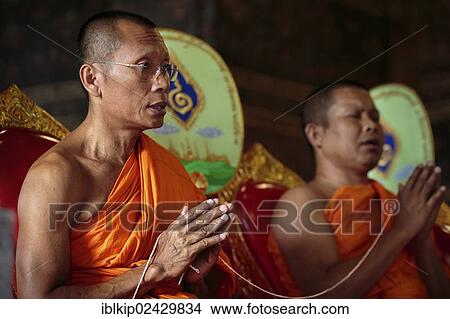 "Two monks praying, Wat Pho, Bangkok, Thailand, Asia" View Large Photo Image Picture - "Two monks praying, Wat Pho, Bangkok, Thailand, Asia". Fotosearch