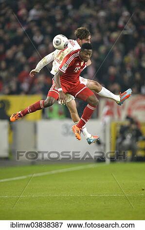 "Two players jumping to head a ball, Martin Harnik, VfB Stuttgart, at the back, vs David Alaba, FC Bavaria Munich, at the front, Mercedes-Benz Arena, Stuttgart, Baden-Wurttemberg, Germany, Europe" View Large Photo Image Stock Photo - "Two players jumping to head a ball, Martin Harnik, VfB Stuttgart, at the back, vs David Alaba, FC Bavaria Munich, at the front, Mercedes-Benz Arena, Stuttgart, Baden-Wurttemberg, Germany, Europe". Fotosearch