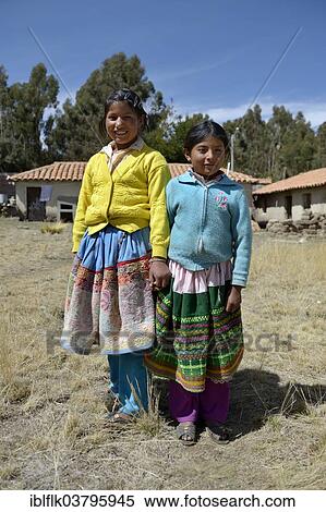 "Two pupils of the primary school, in traditional colorful clothes of the Quechua, Union Potrero, Quispillacta, Ayacucho, Peru, South America" View Large Photo Image Stock Photography - "Two pupils of the primary school, in traditional colorful clothes of the Quechua, Union Potrero, Quispillacta, Ayacucho, Peru, South America". Fotosearch