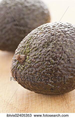 Two ripe avocados View Large Photo Image Stock Image - Two ripe avocados. Fotosearch