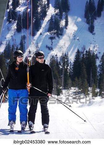"Two skiers on ski lift Fellhorn, Oberstdorf, Allgaeu, Bavaria, Germany, Europe" View Large Photo Image Stock Image - "Two skiers on ski lift Fellhorn, Oberstdorf, Allgaeu, Bavaria, Germany, Europe". Fotosearch