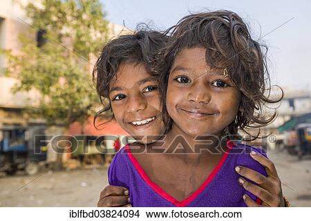 "Two smiling street kids, Bhavnagar, Gujarat, India, Asia" View Large Photo Image Picture - "Two smiling street kids, Bhavnagar, Gujarat, India, Asia". Fotosearch