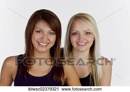 "Two smiling young women, portrait" View Large Photo Image Stock Image - "Two smiling young women, portrait". Fotosearch